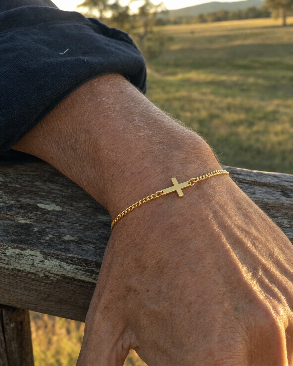 Cross Bracelet Gold worn outdoors in late afternoon light