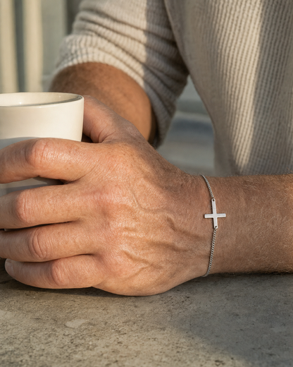 Cross Bracelet worn at a kitchen bench