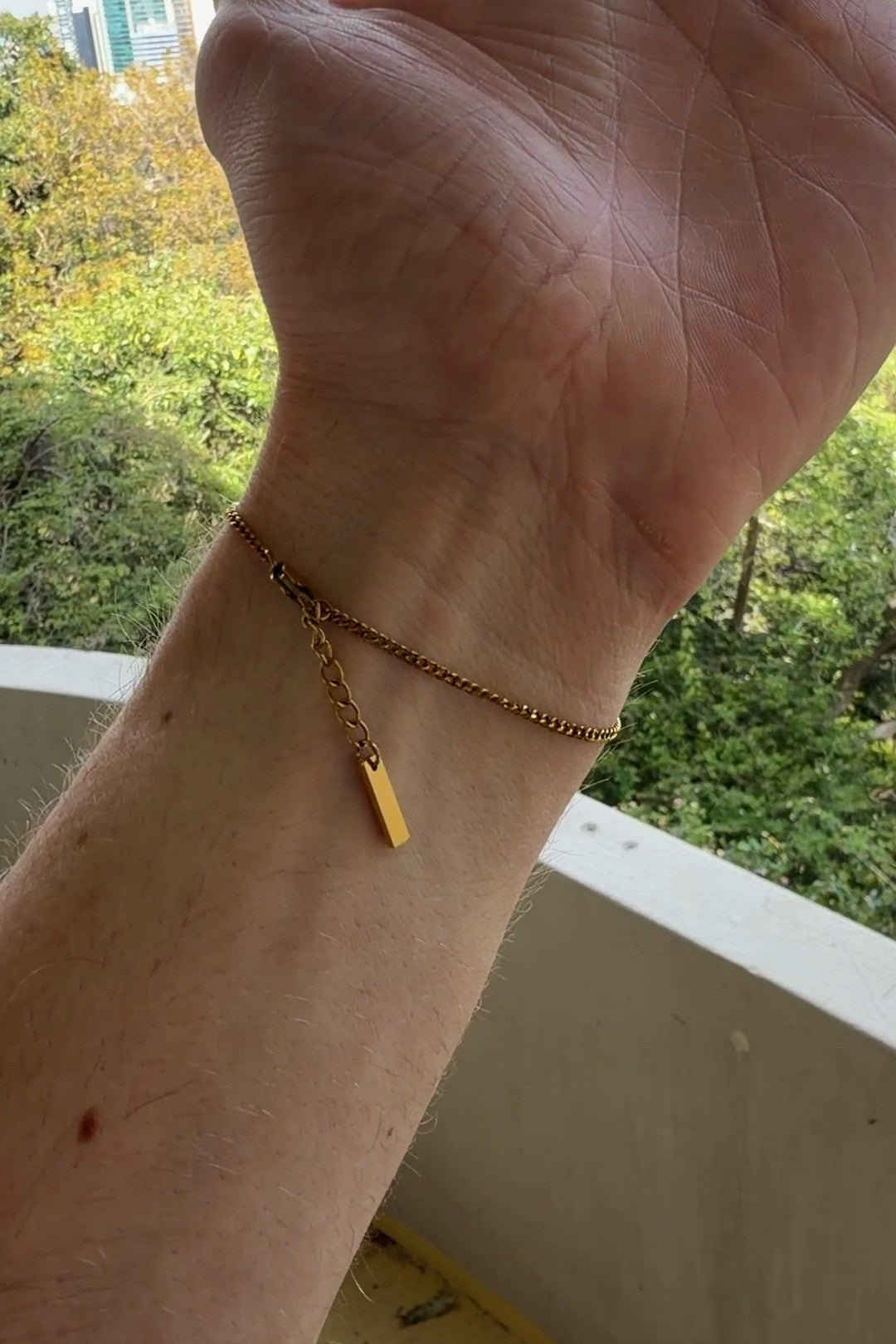 Cuban bracelet, on the wrist