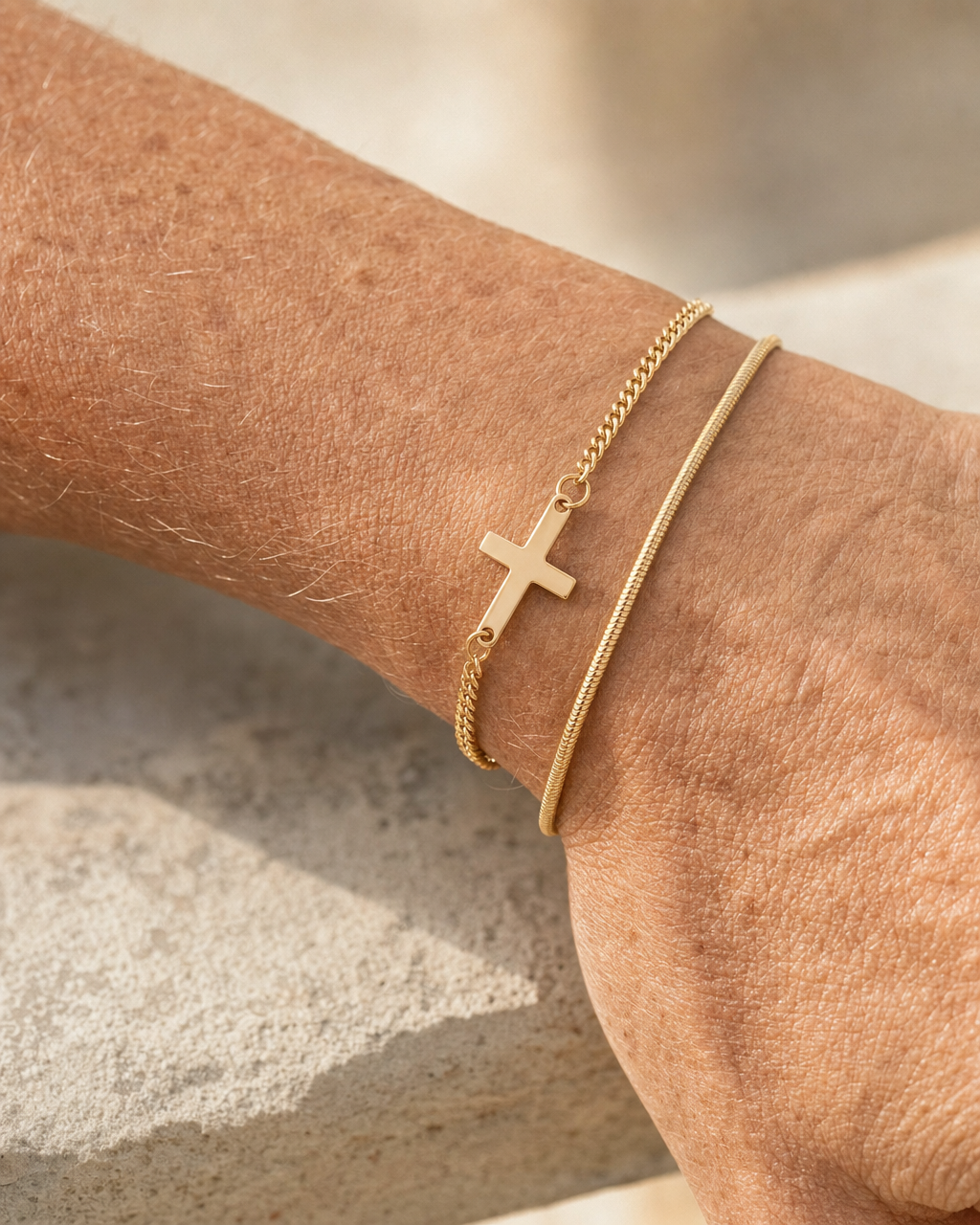 Cross Bracelet Gold worn stacked with a second bracelet