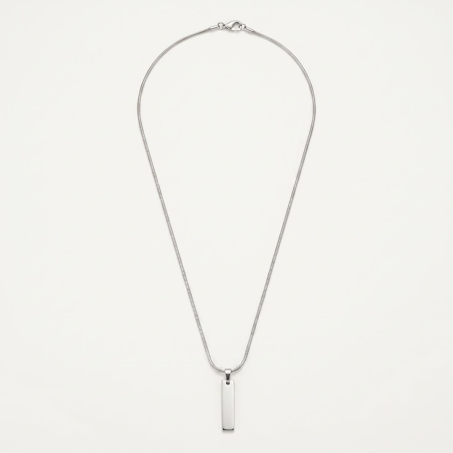 Silver bar pendant necklace on white
