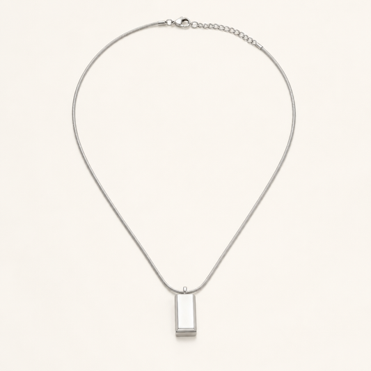 Block pendant necklace on white