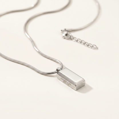 Close-up of the 3D block pendant