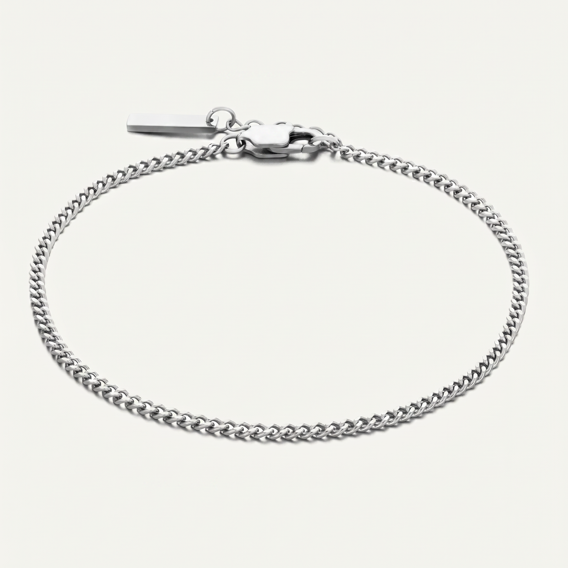 Silver Cuban link bracelet on white