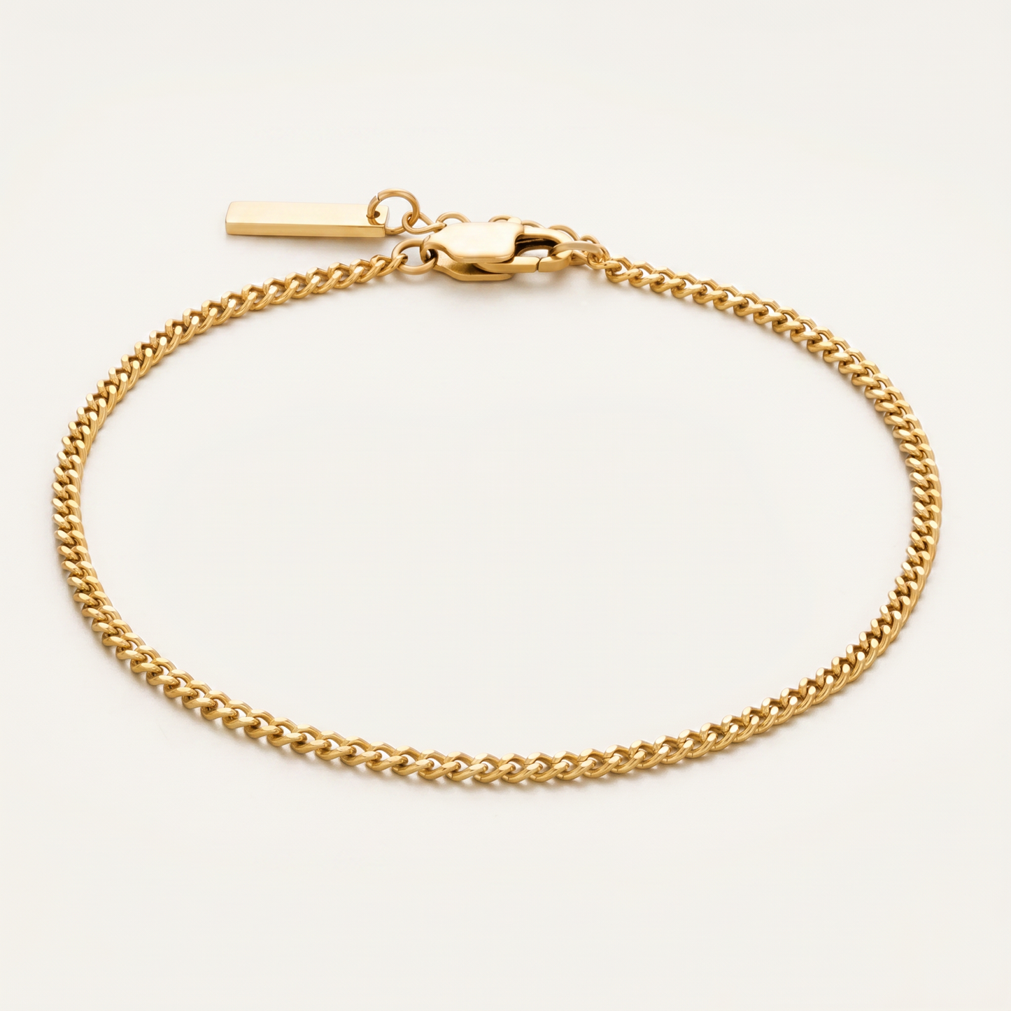 Gold 4mm Cuban link bracelet on white