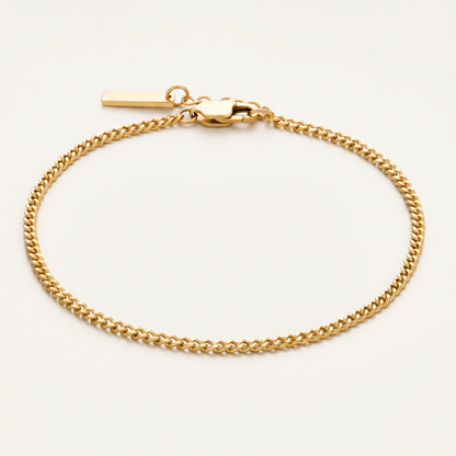 Gold 4mm Cuban link bracelet on white