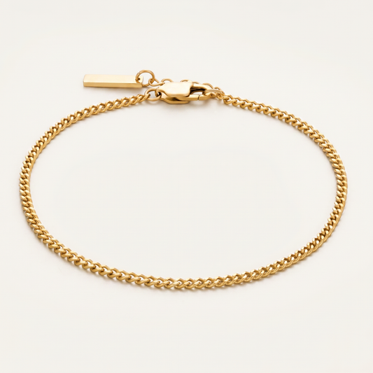 Gold 4mm Cuban link bracelet on white