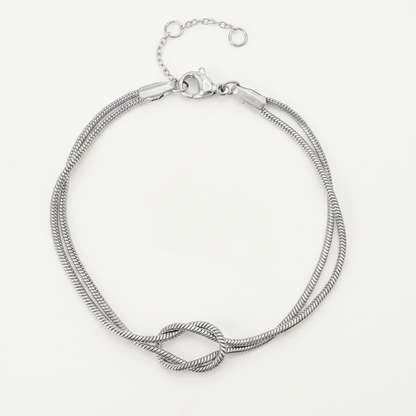 Silver knot bracelet on white