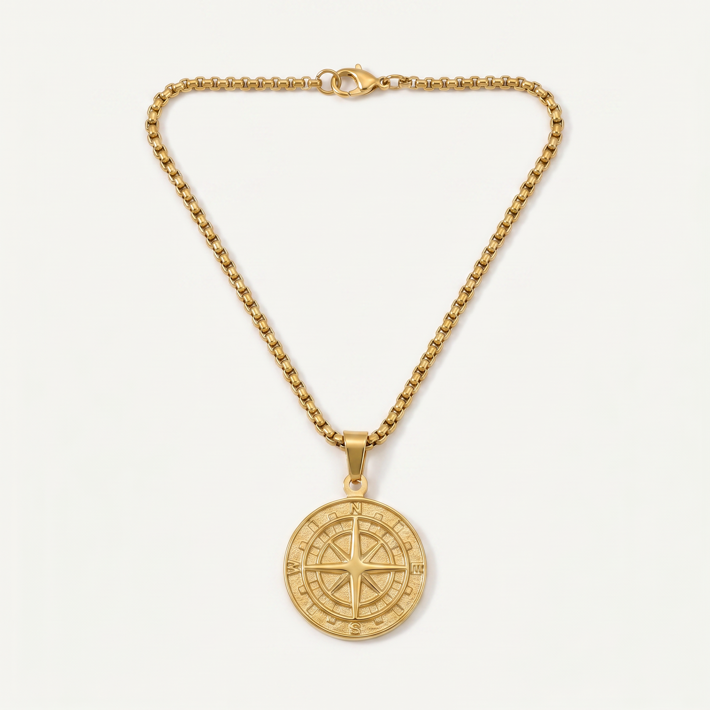 North Star compass pendant necklace in gold-tone stainless steel