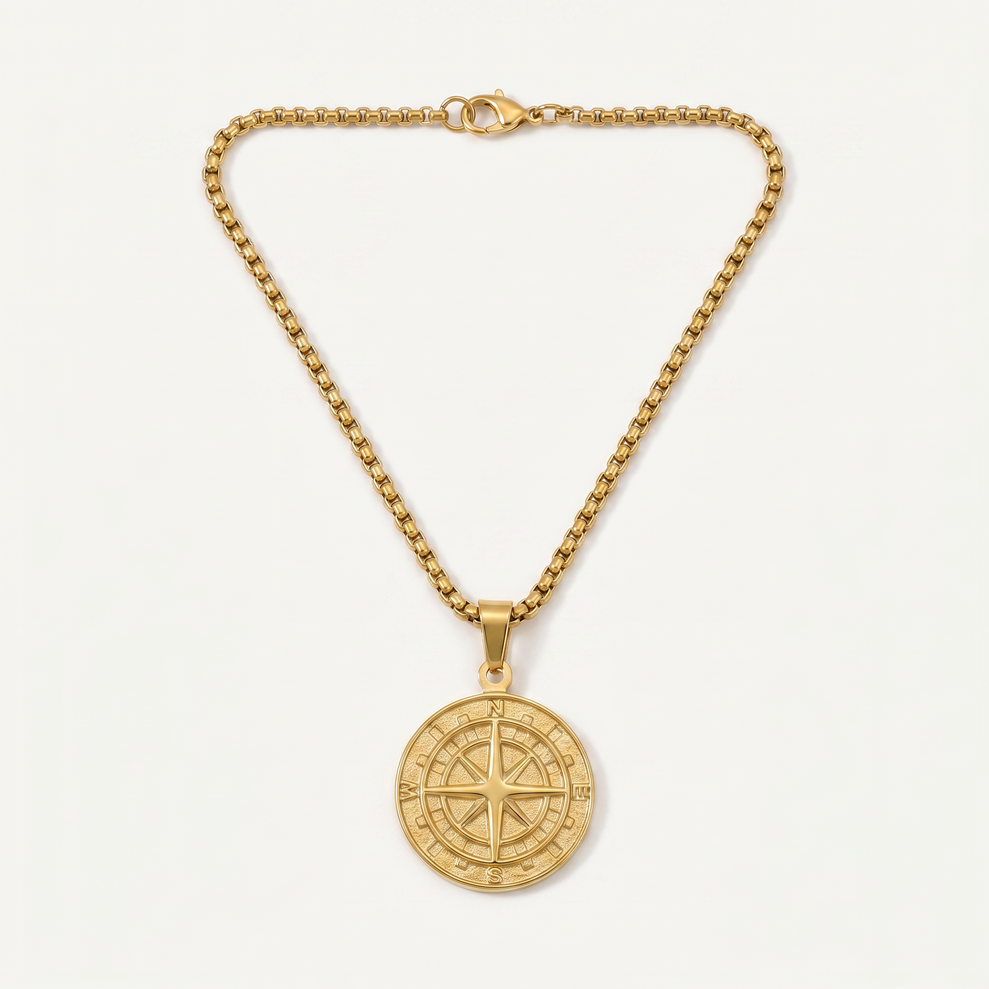 North Star compass pendant necklace in gold-tone stainless steel