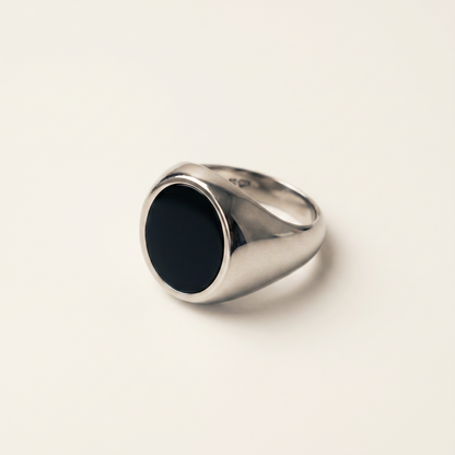 Close-up of the round onyx signet