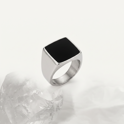 Square onyx signet ring on white