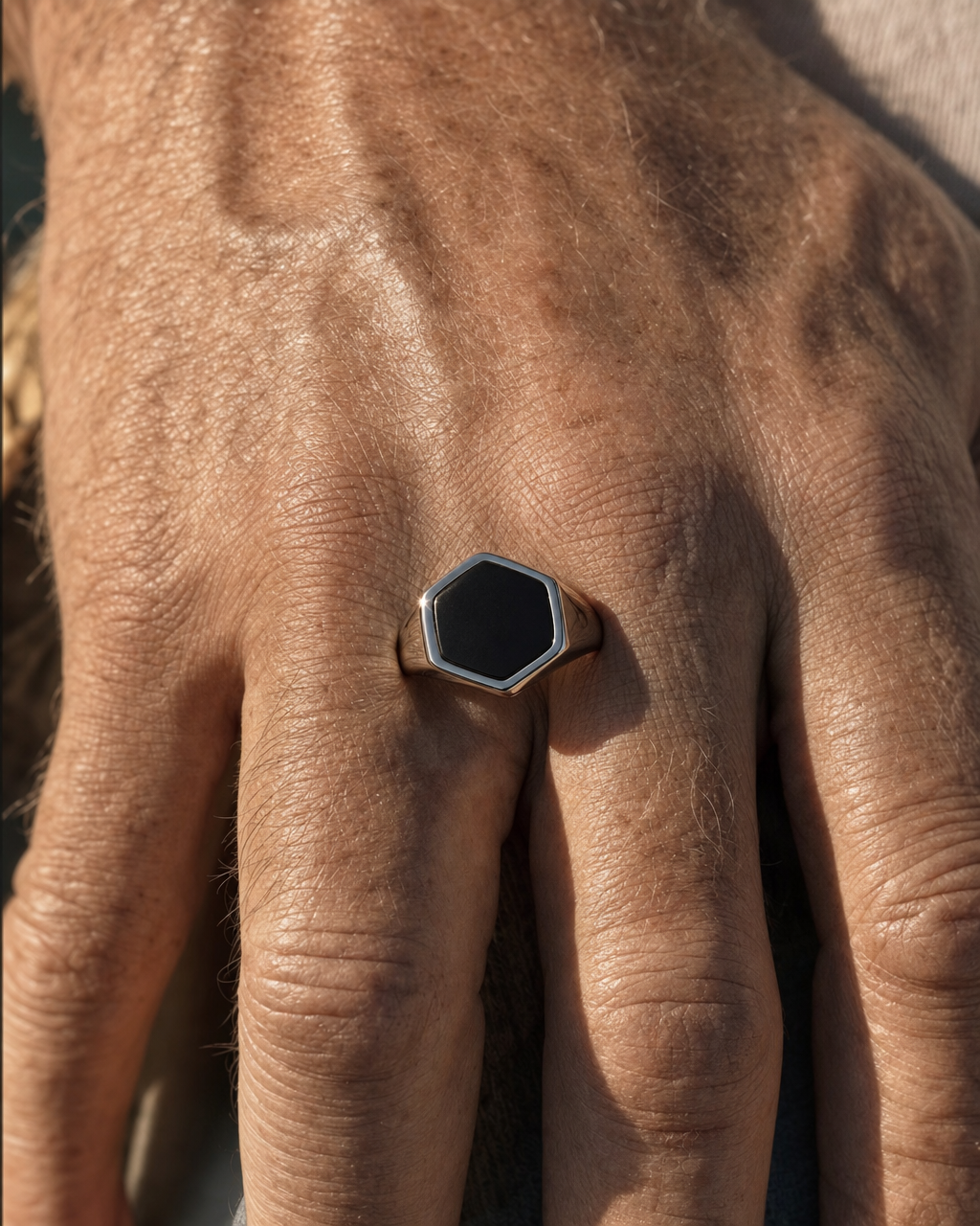 Onyx Signet Ring, Hexagon Face, macro knuckle