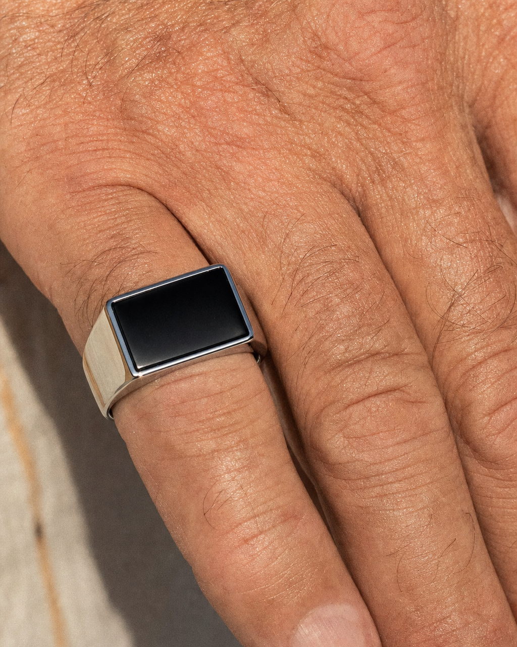 Onyx Signet Ring, Rectangle Face, macro knuckle