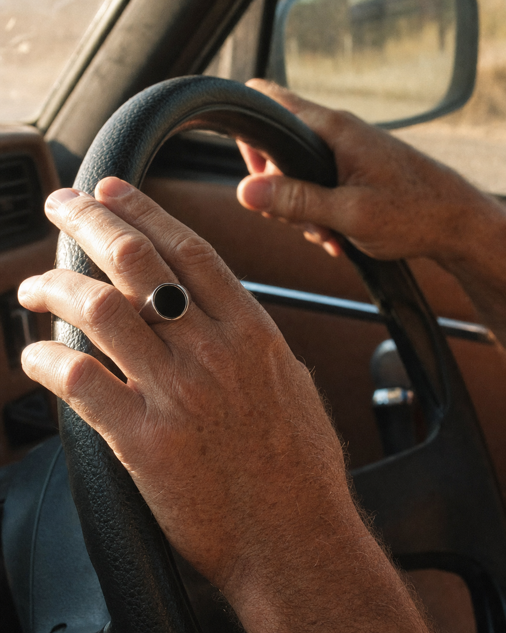 Onyx Signet Ring, Round Face, steering wheel
