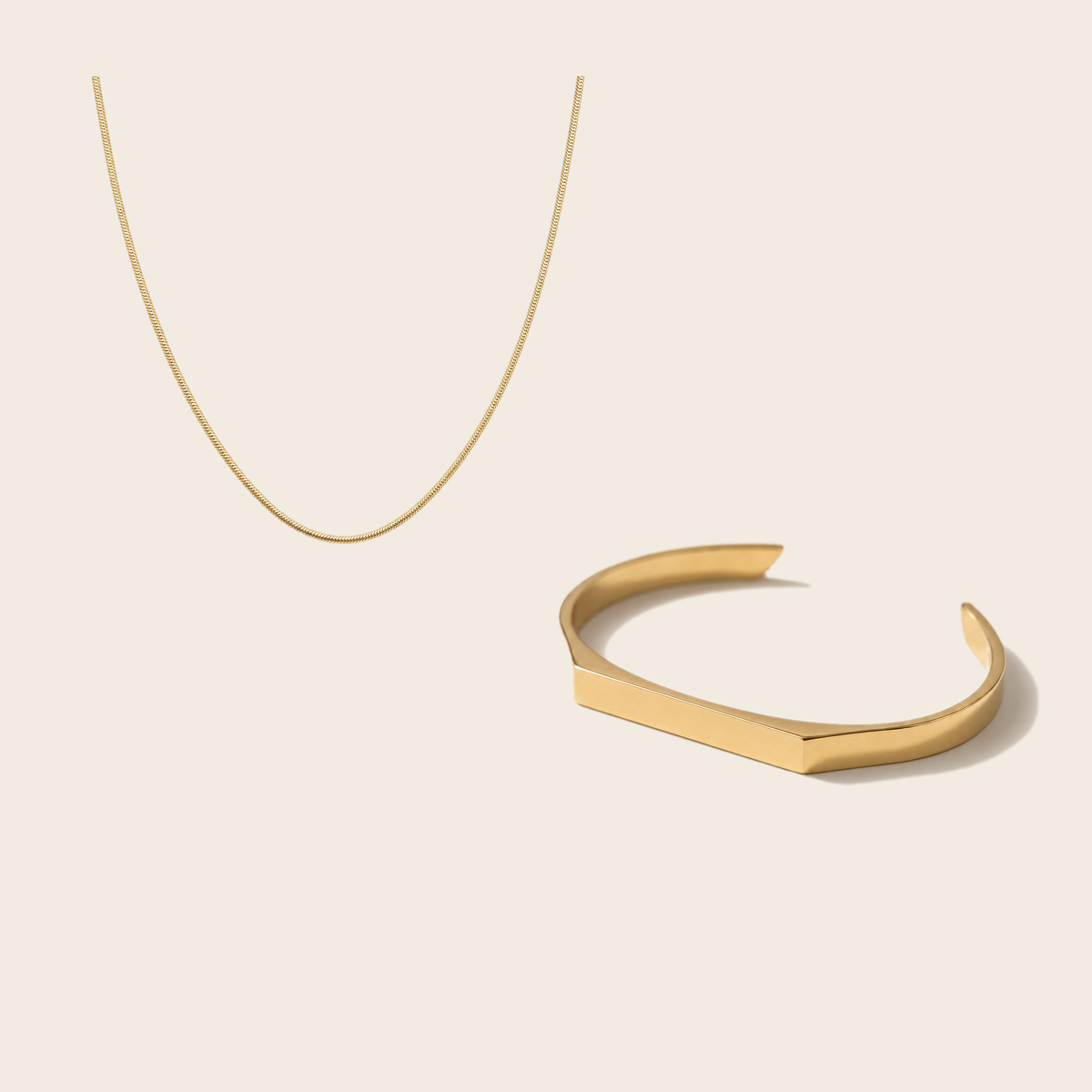 pair packshot: the open cuff pair gold