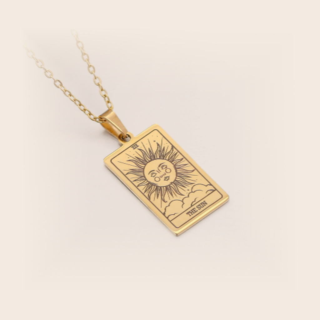 Tarot Necklace Gold, The Sun, studio packshot on cream