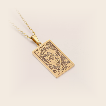 Tarot Necklace Gold, The World, studio packshot on cream