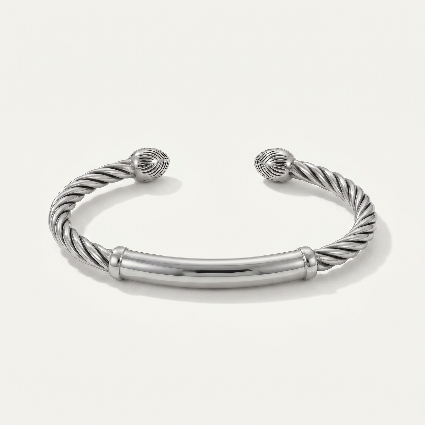 Silver twisted cable cuff on white